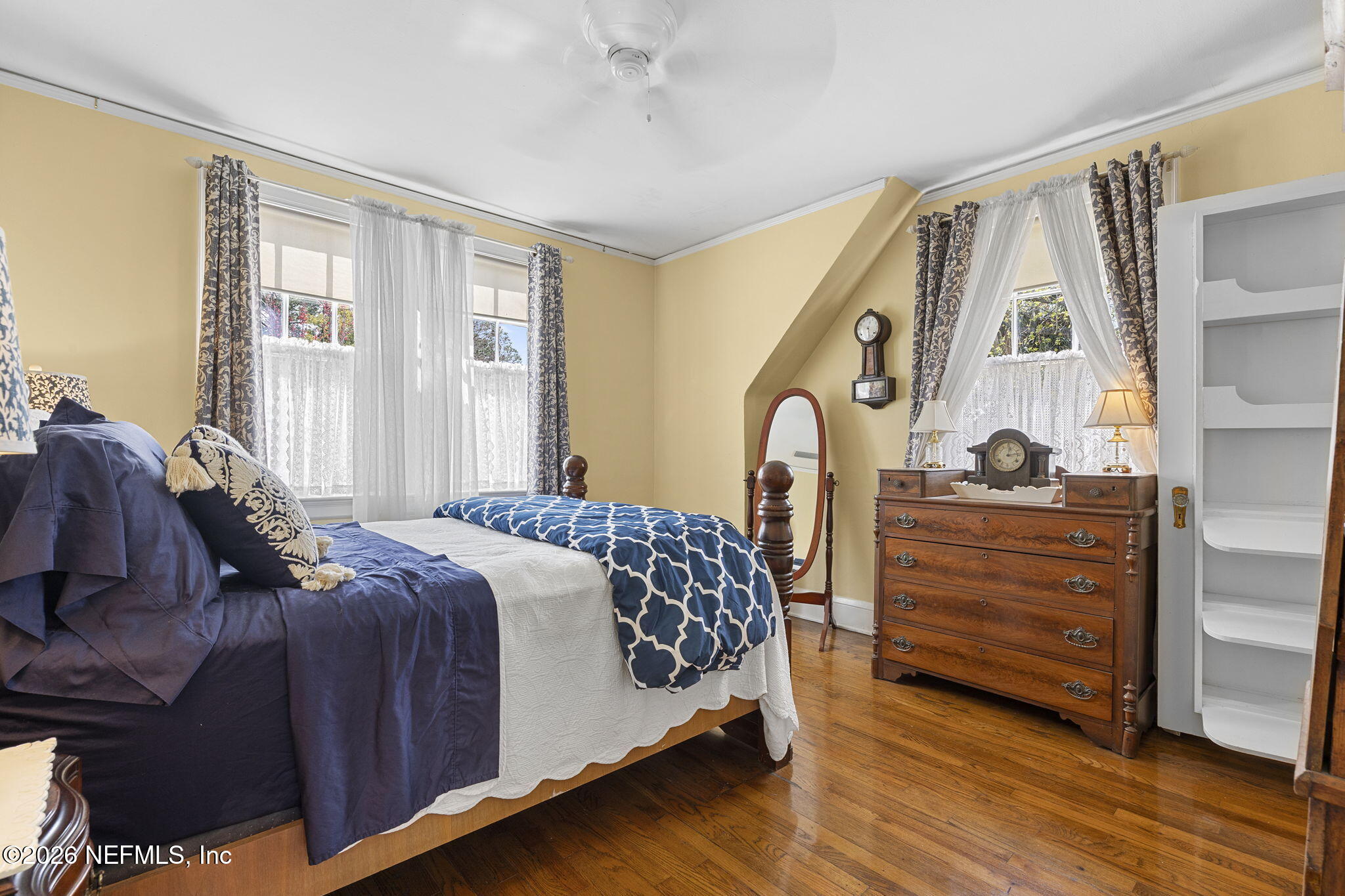 1127 Riviera Street Jacksonville, FL 32207 - Photo 31 of 40 a bedroom with a bed and a window