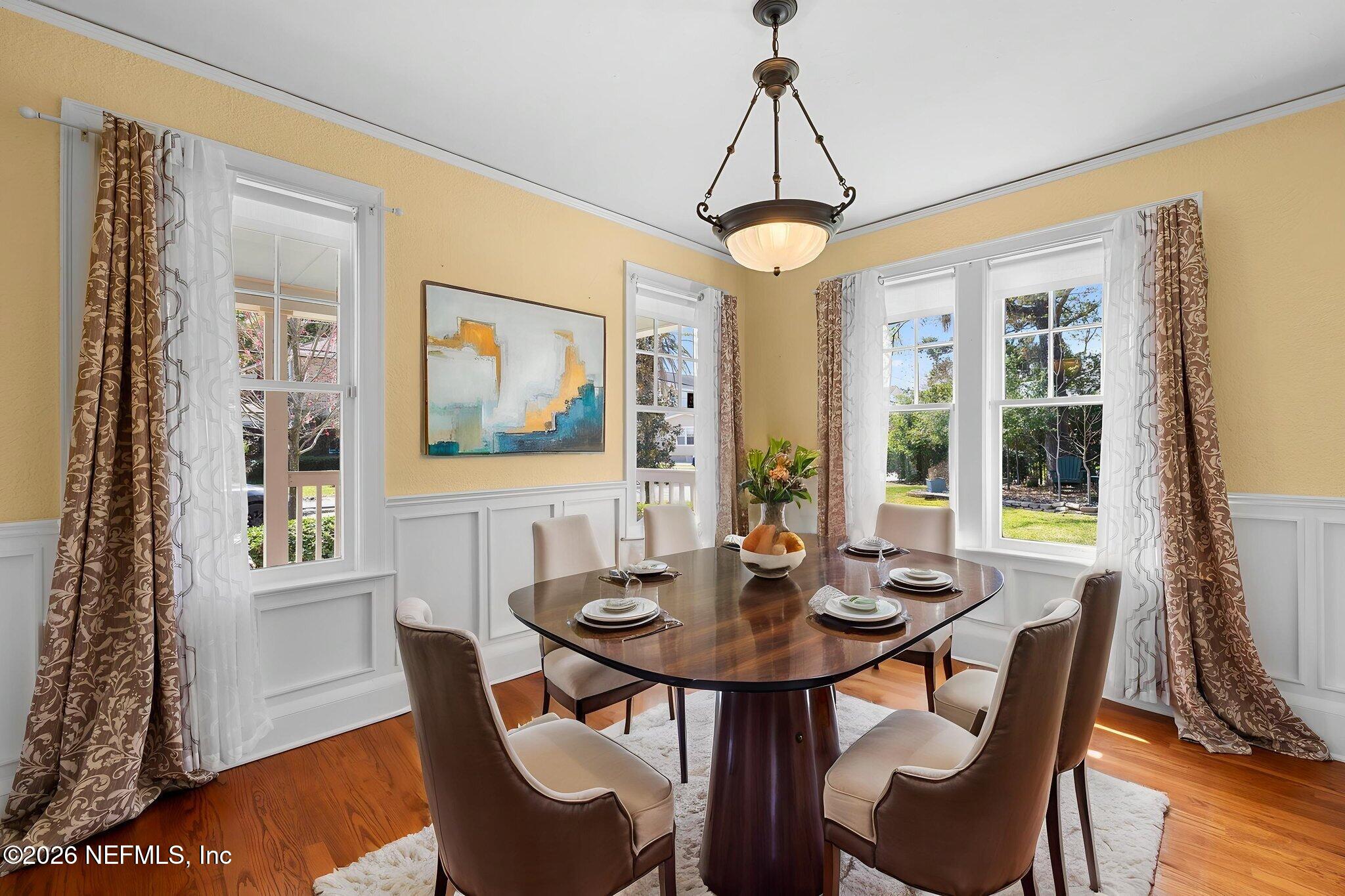 1127 Riviera Street Jacksonville, FL 32207 - Photo 9 of 40 a view of a dining room with furniture window and wooden floor