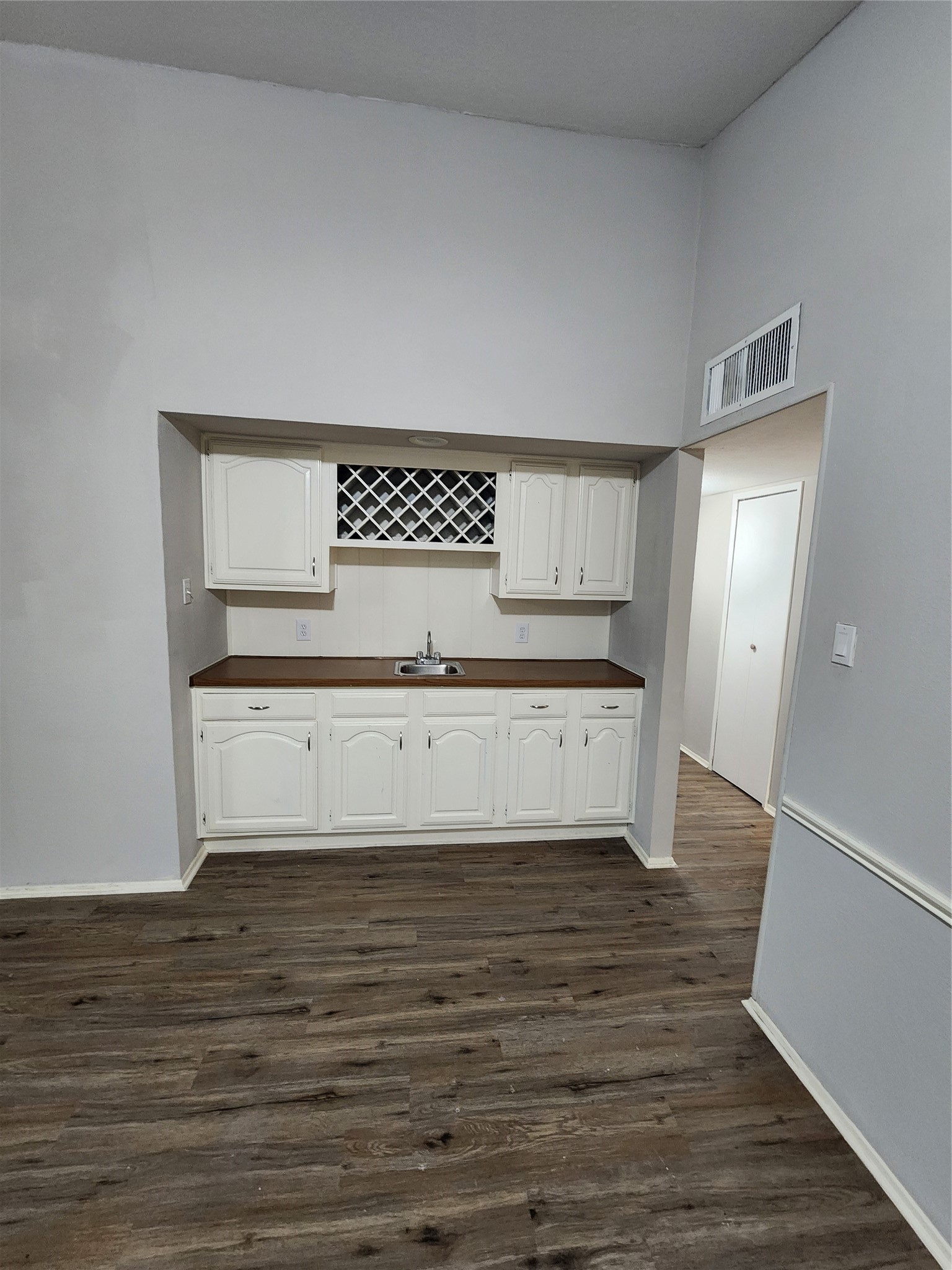 3822 Broken Elm Drive Spring, TX 77388 - Photo 7 of 25 a view of cabinets with wooden floor