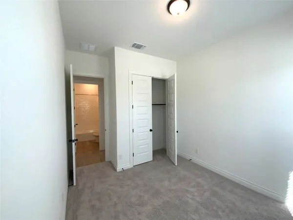 a bathroom with a tub and a sink