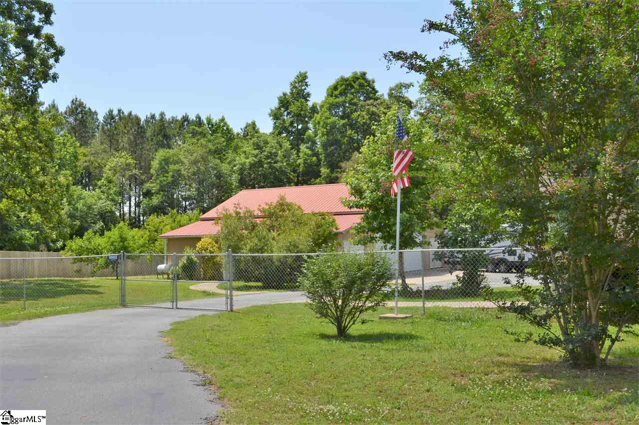 2244 Trail Road Belton, SC 29627 - Photo 3 of 29 Extended drive with privacy gate -- wide enough for all your guests.