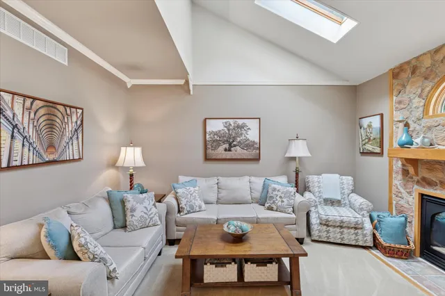 a living room with furniture and a couch