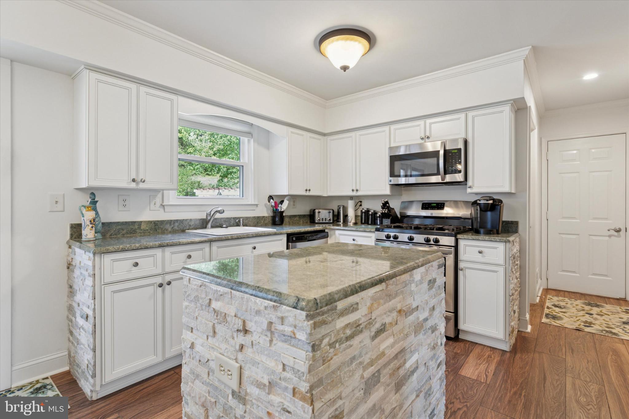 1402 Valley View Warrington, PA 18976 - Photo 15 of 51 a kitchen with appliances a sink and cabinets