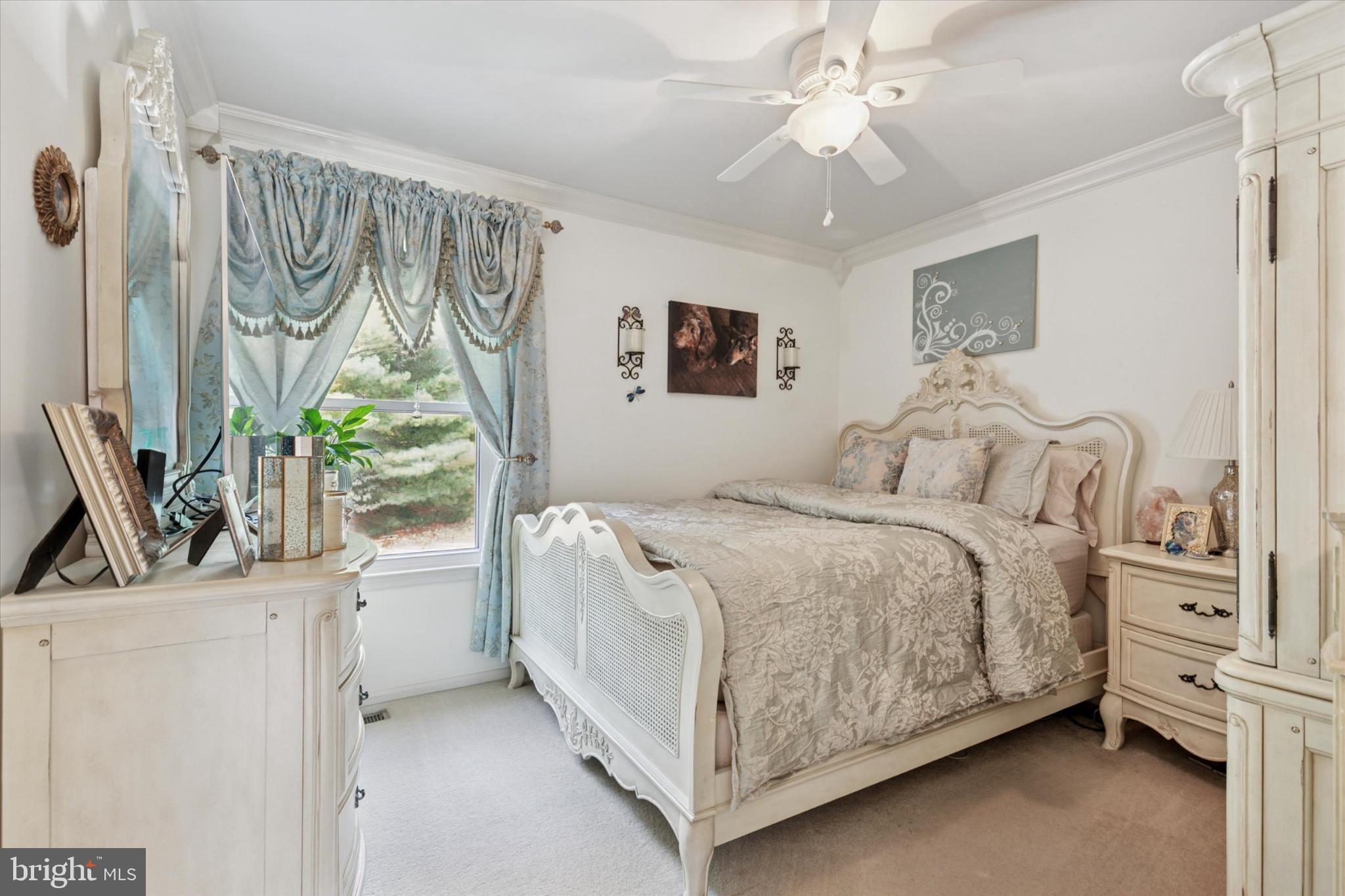 1402 Valley View Warrington, PA 18976 - Photo 23 of 51 a bedroom with a bed and a flat tv screen on the dresser