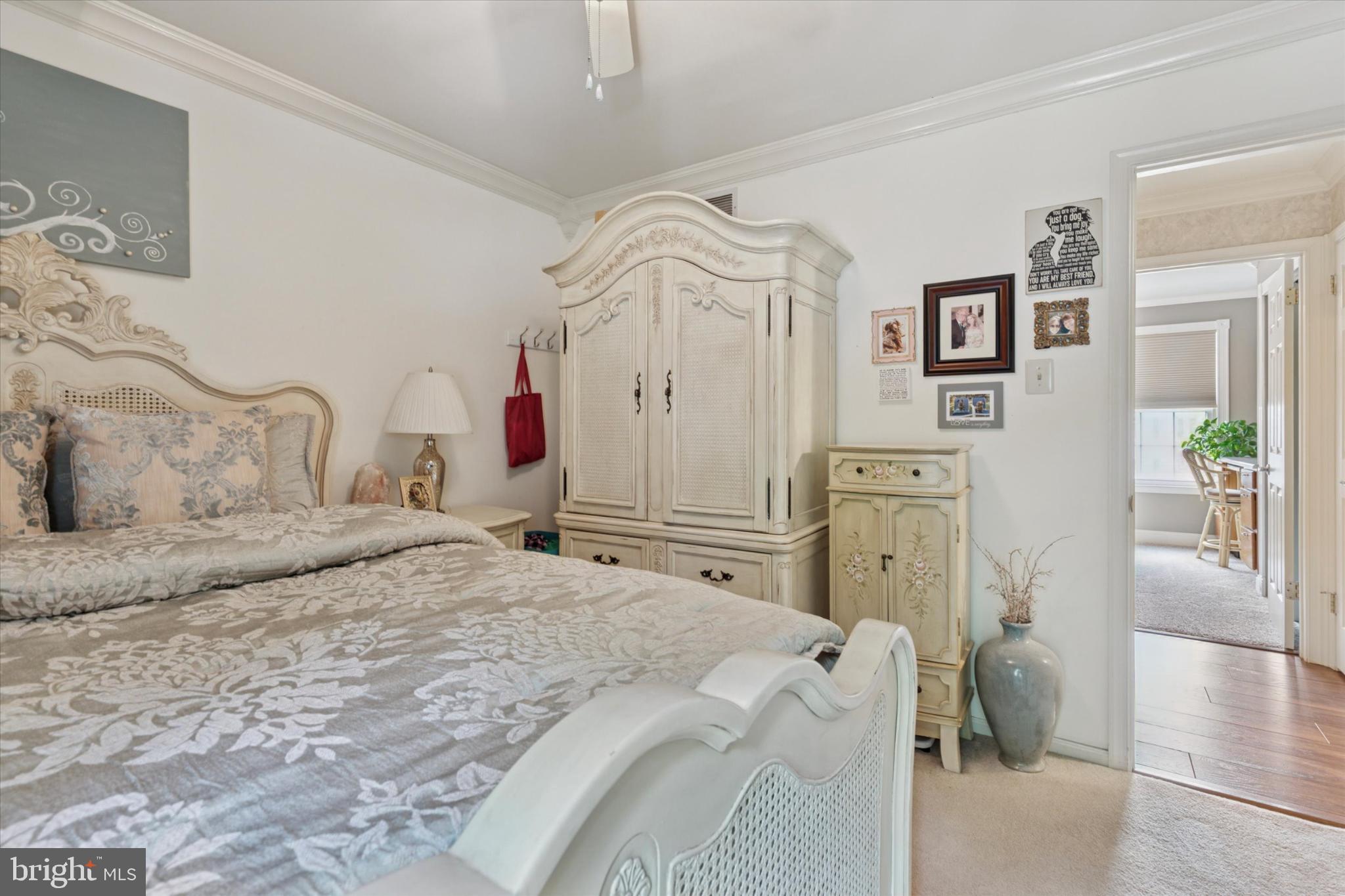 1402 Valley View Warrington, PA 18976 - Photo 24 of 51 a bedroom with a bed and a chandelier