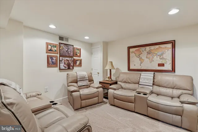 a living room with furniture and a couch