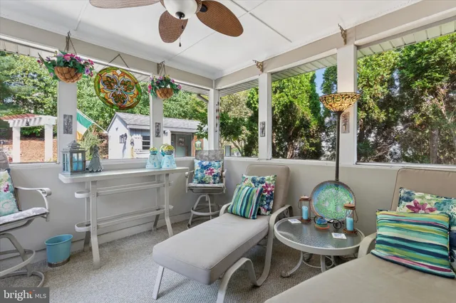 a room with furniture and a large window