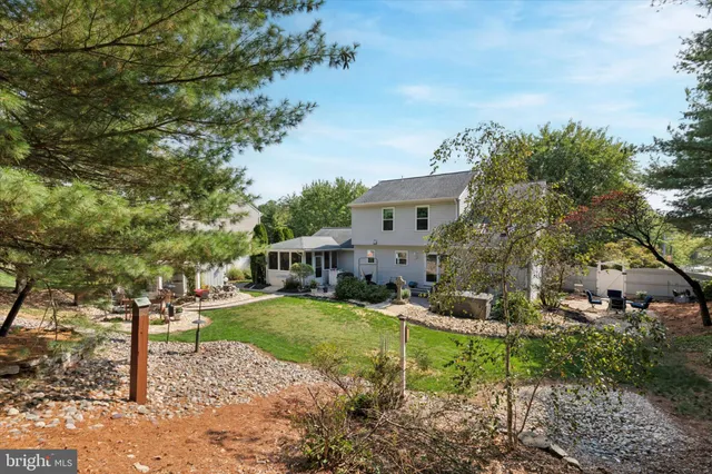 a backyard of a house with lots of green space