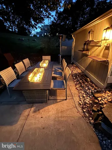 a view of a bench in a patio