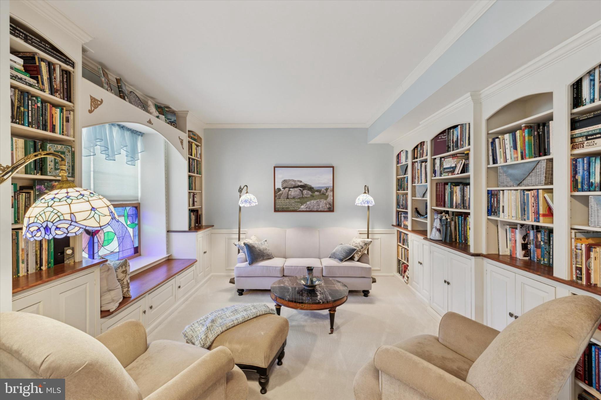 1402 Valley View Warrington, PA 18976 - Photo 8 of 51 a living room with furniture workspace and a book shelf