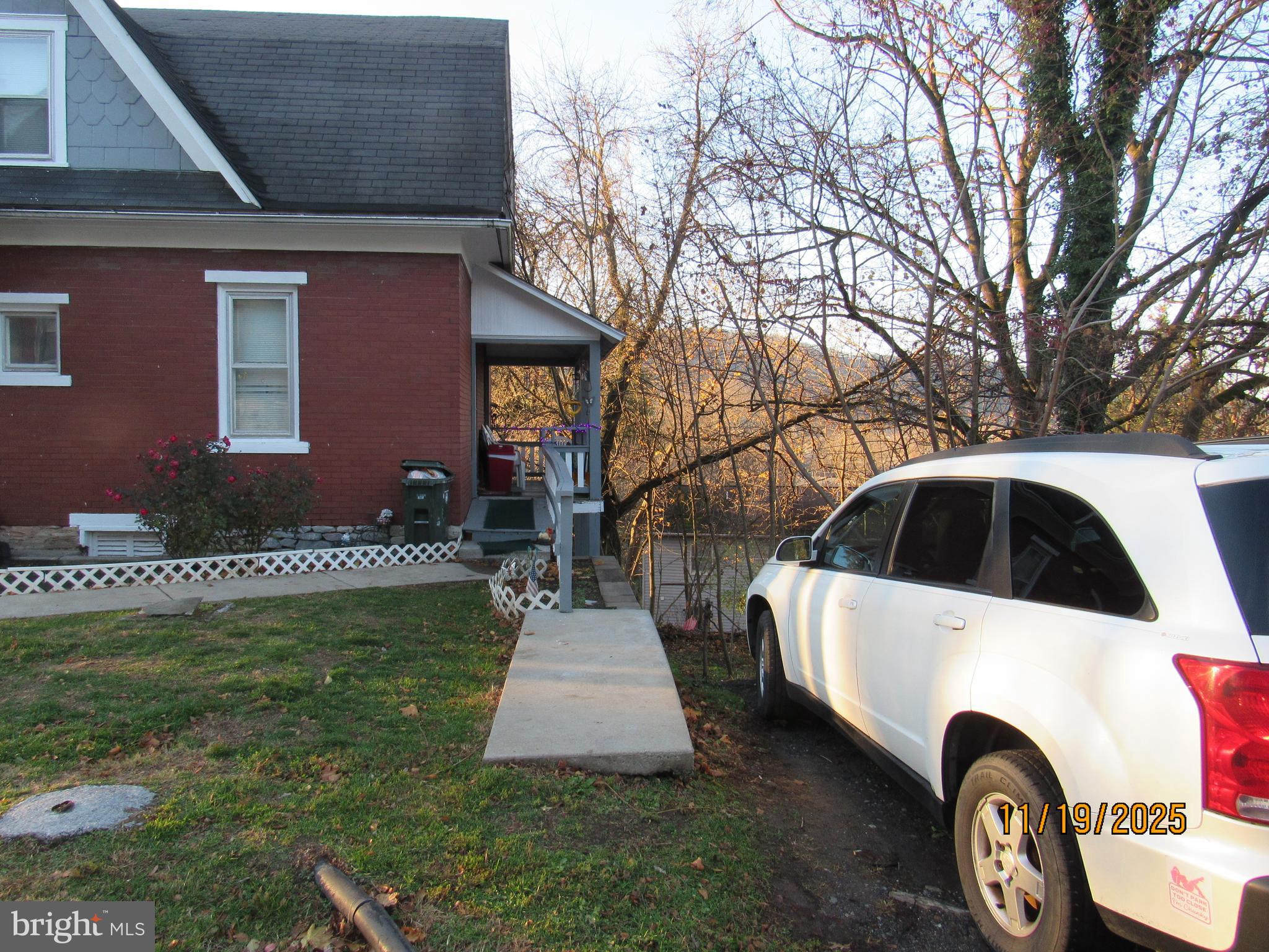 316 South Spring Street Bellefonte, PA 16823 - Photo 4 of 4 a view of a white house with a yard and sitting area