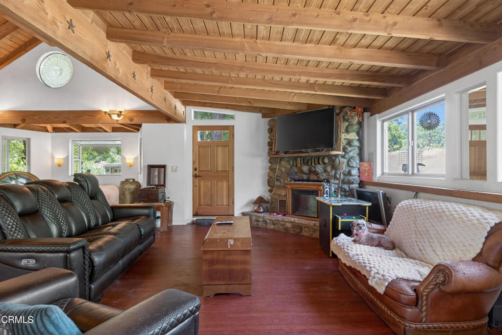 8416 Wheeler Canyon Road Santa Paula, CA 93060 - Photo 10 of 48 a living room with furniture and a large window