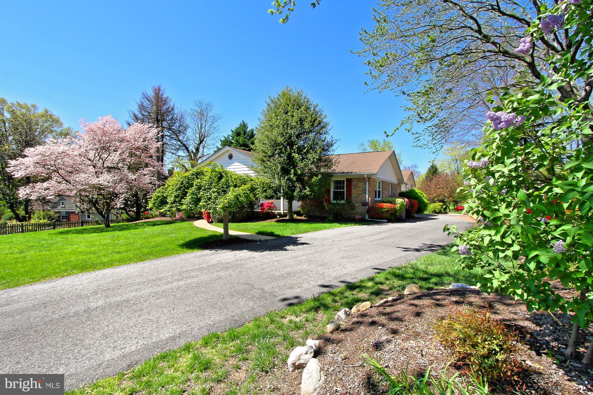8228 Higham Road Lorton, VA 22079 - Photo 3 of 30 Home is Nestled on a Picturesque Half Acre + Lot!