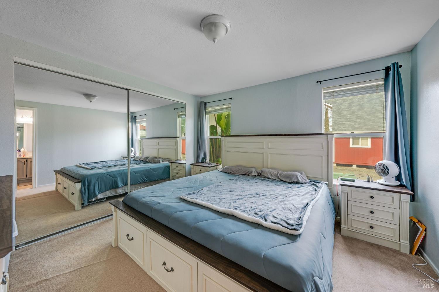 7500 North Meridian Road Vacaville, CA 95688 - Photo 26 of 38 a bedroom with a bed and a dresser