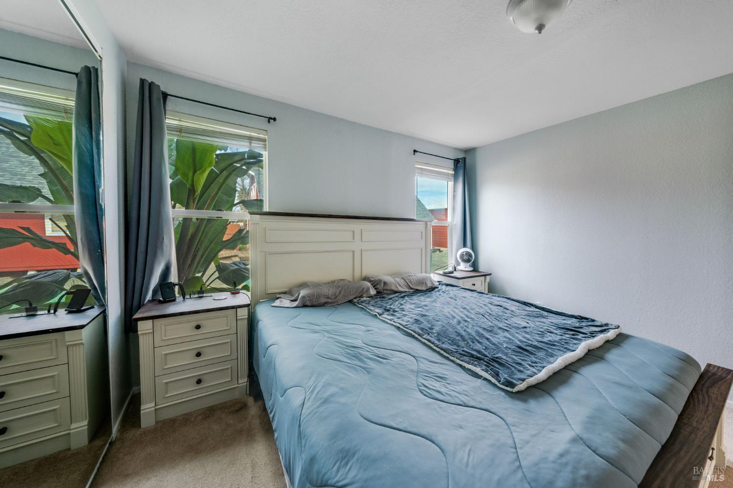 7500 North Meridian Road Vacaville, CA 95688 - Photo 27 of 38 a bedroom with a bed and a window