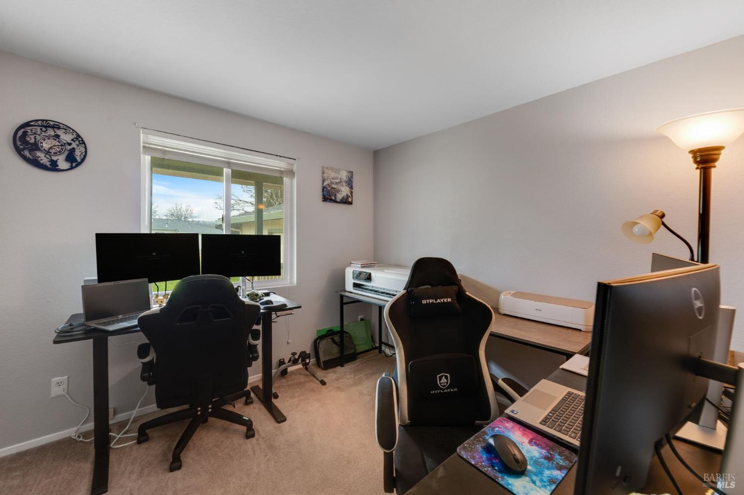 7500 North Meridian Road Vacaville, CA 95688 - Photo 31 of 38 a view of a workspace with furniture and a window