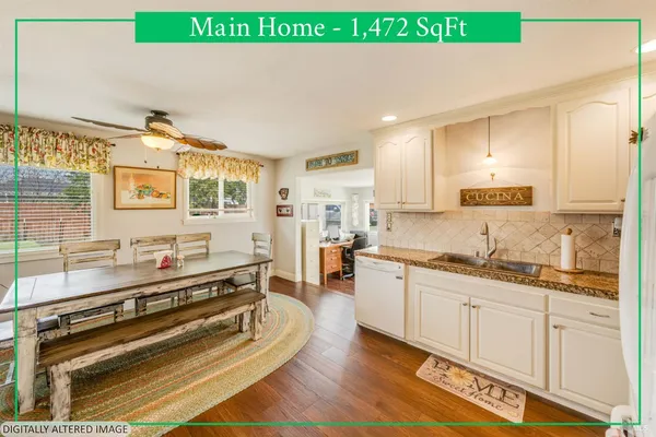 a kitchen with appliances cabinets and a sink