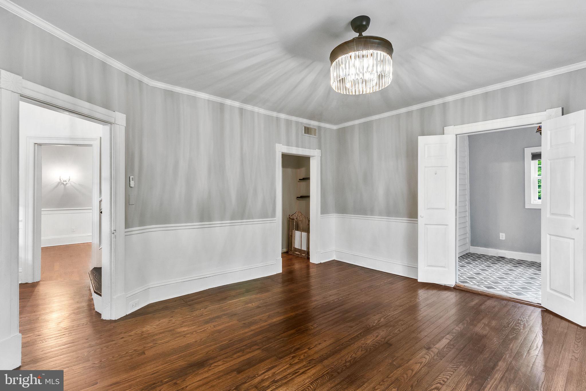 3952 Irvington Road Irvington, VA 22480 - Photo 11 of 77 a view of a hallway with wooden floor