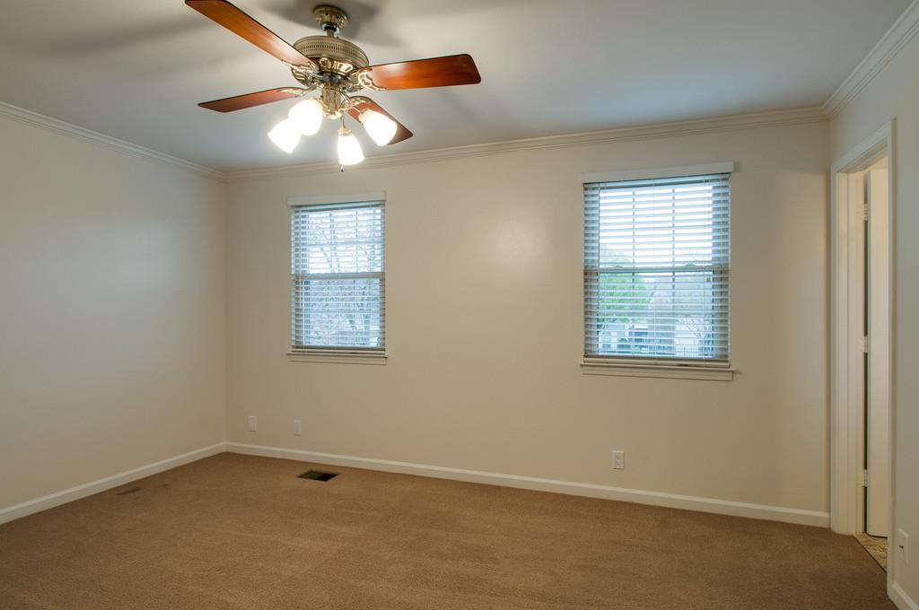 1243 General George Patton Road Nashville, TN 37221 - Photo 12 of 25 an empty room with a window and a fan