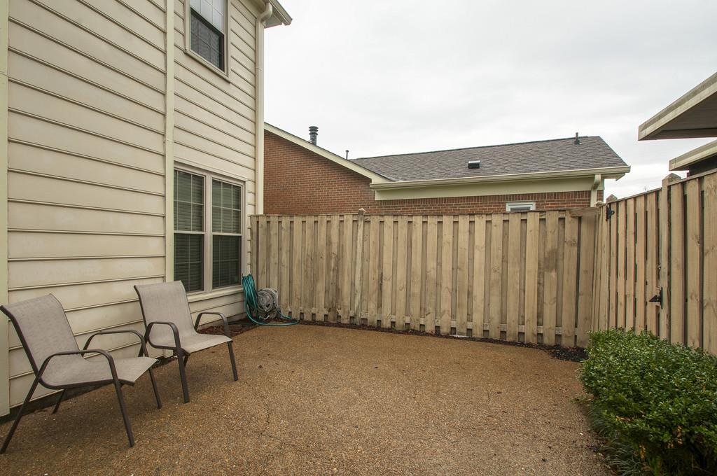 1243 General George Patton Road Nashville, TN 37221 - Photo 22 of 25 a view of a backyard with chairs