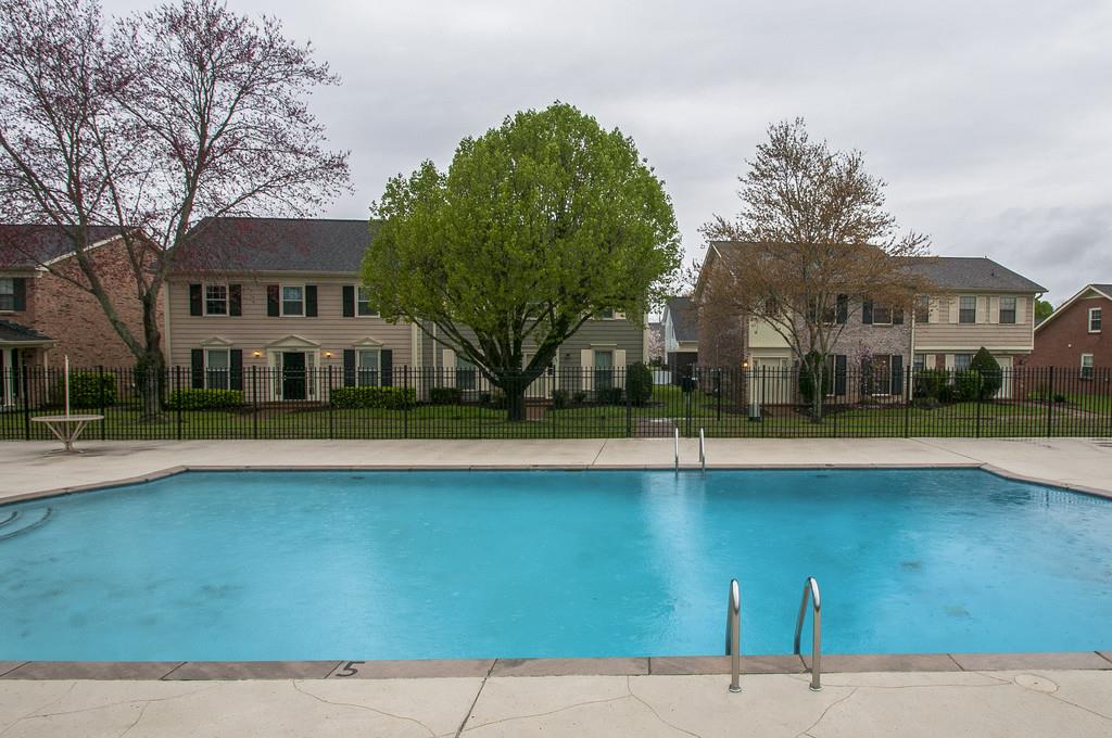 1243 General George Patton Road Nashville, TN 37221 - Photo 25 of 25 a view of house with swimming pool and yard