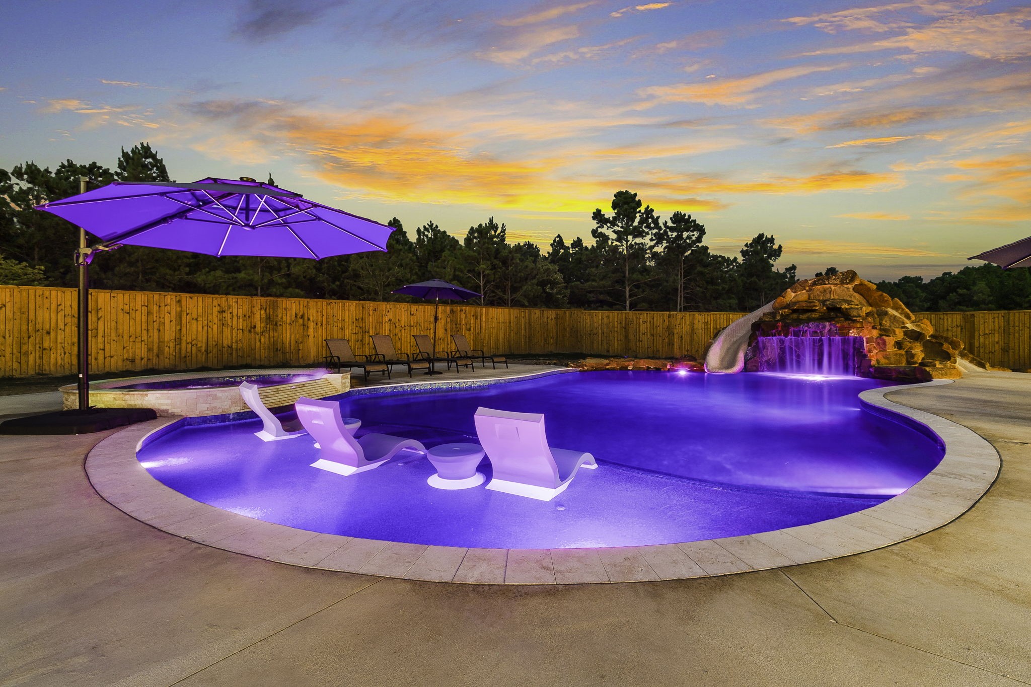 4602 Fm 3459 Road Onalaska, TX 77360 - Photo 9 of 45 a view of swimming pool with red chairs