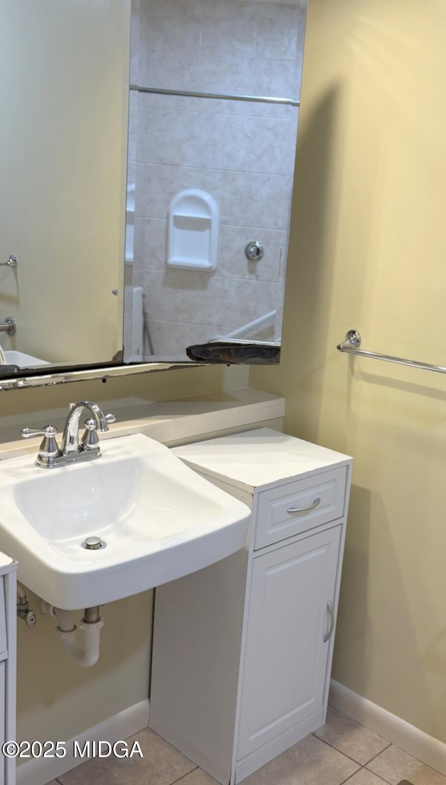 161 Ten Knolls Drive Macon, GA 31210 - Photo 16 of 21 a bathroom with a sink and a mirror