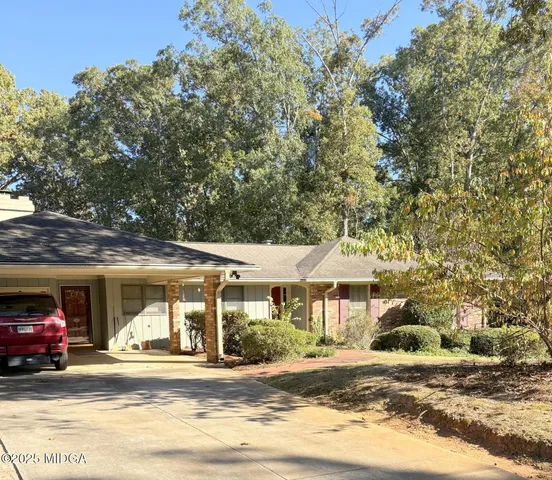 a view of a car park in front of a building