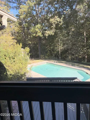 a view of a yard with an outdoor space