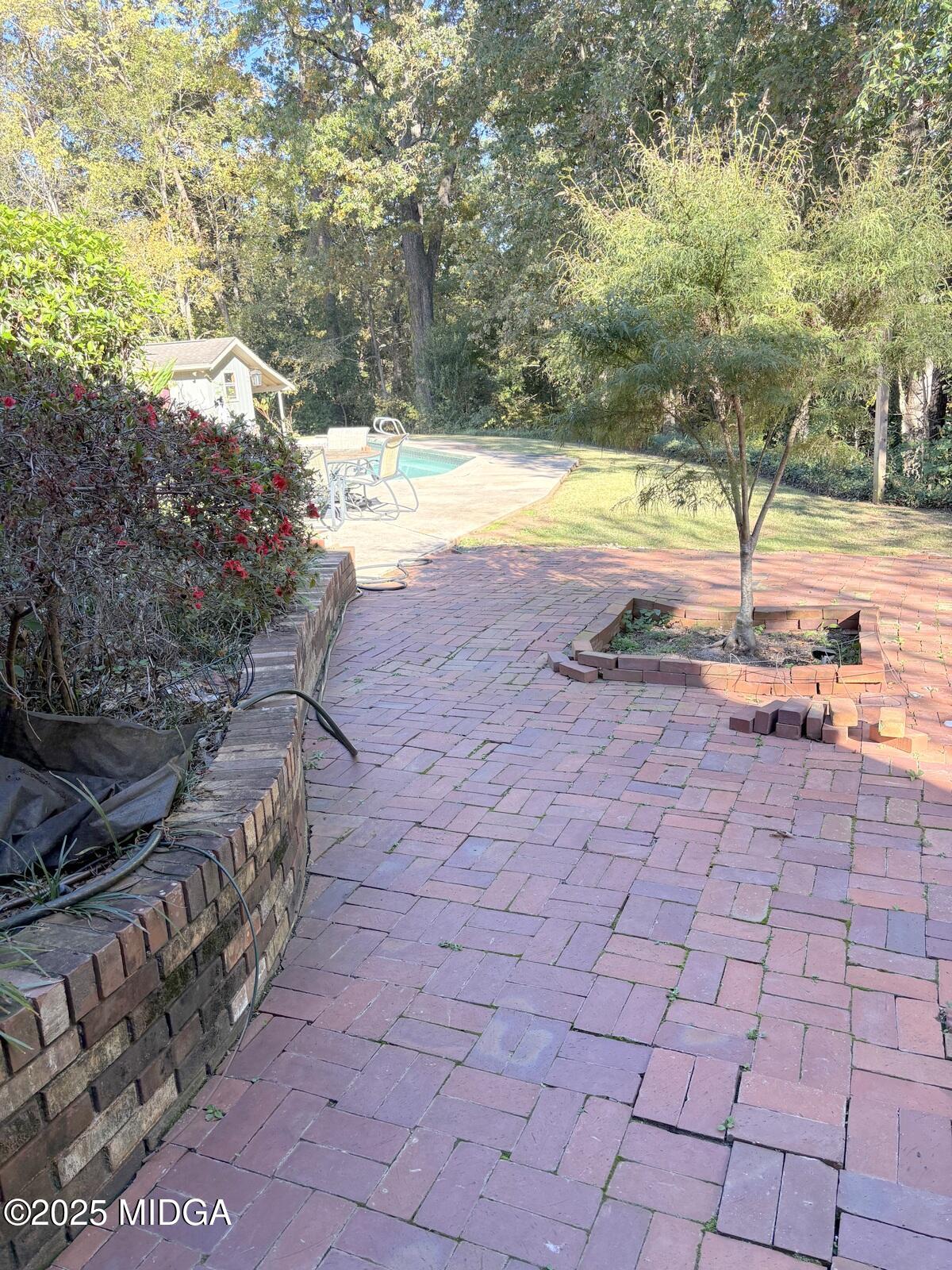 161 Ten Knolls Drive Macon, GA 31210 - Photo 20 of 21 a view of a yard with an outdoor space