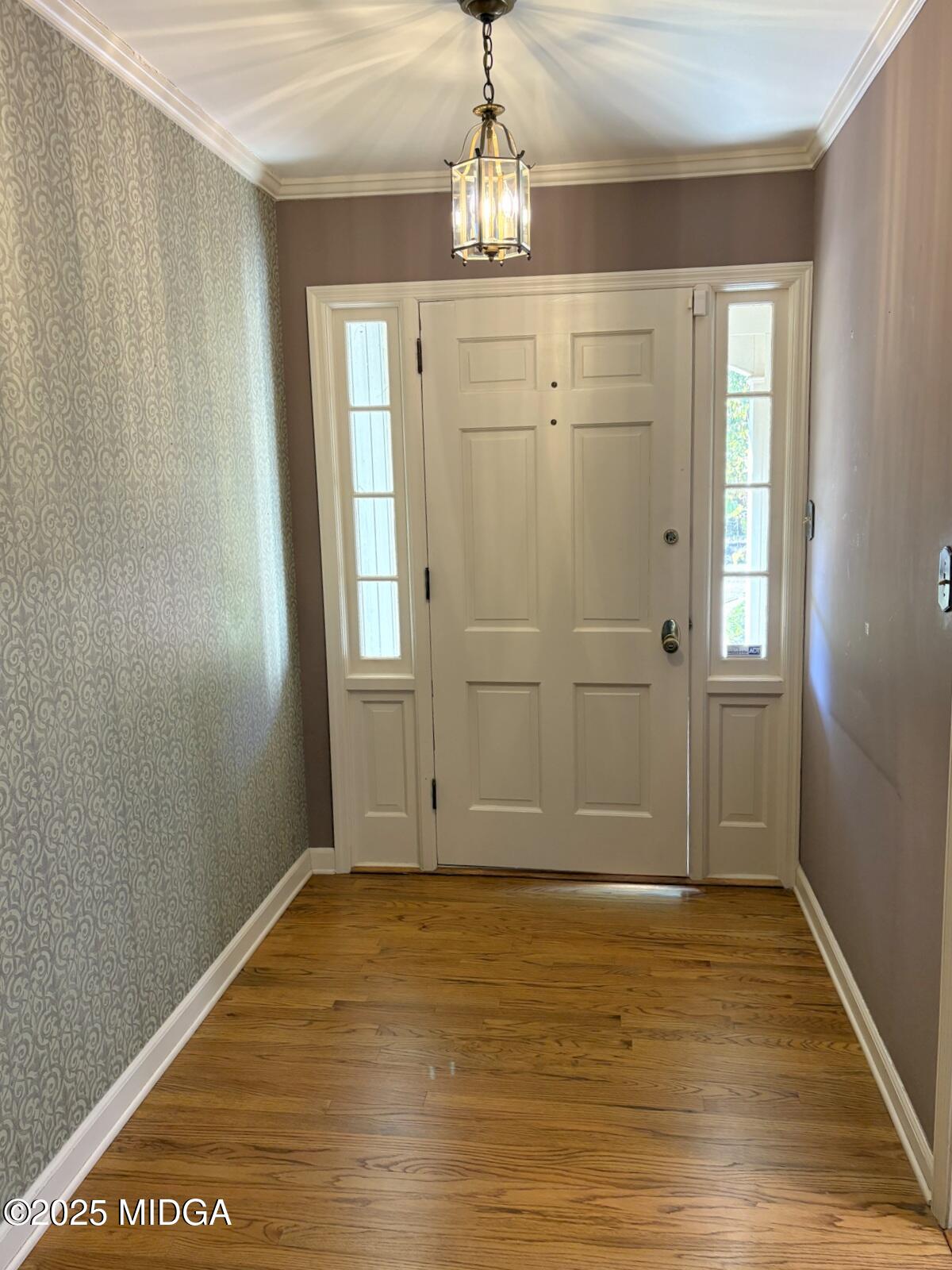 161 Ten Knolls Drive Macon, GA 31210 - Photo 3 of 21 a view of empty room with wooden floor and fan