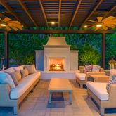 a outdoor living space with furniture and garden view