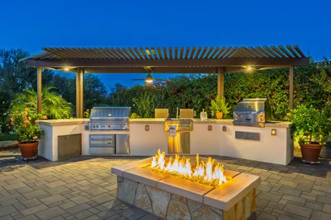 a view of a patio with swimming pool table and chairs