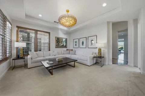 a view of walk in closet with clothes