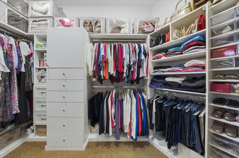 a view of swimming pool with outdoor seating and a patio