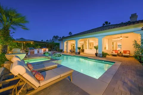 an aerial view of a house with a garden