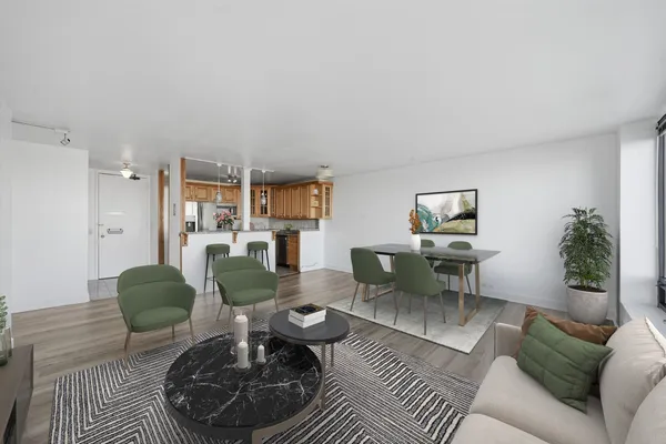 a living room with furniture and a table