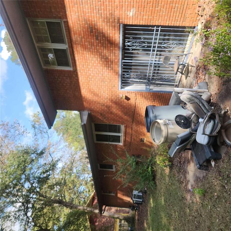 4461 Yates Road College Park, GA 30337 - Photo 15 of 19 a backyard of a house with seating space