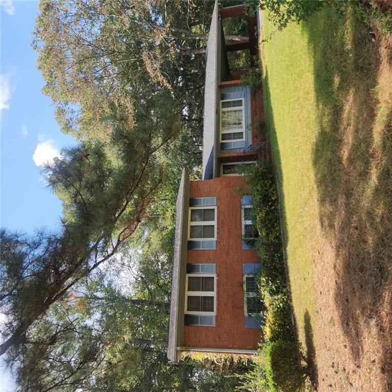 4461 Yates Road College Park, GA 30337 - Photo 19 of 19 a view of a house with a swimming pool