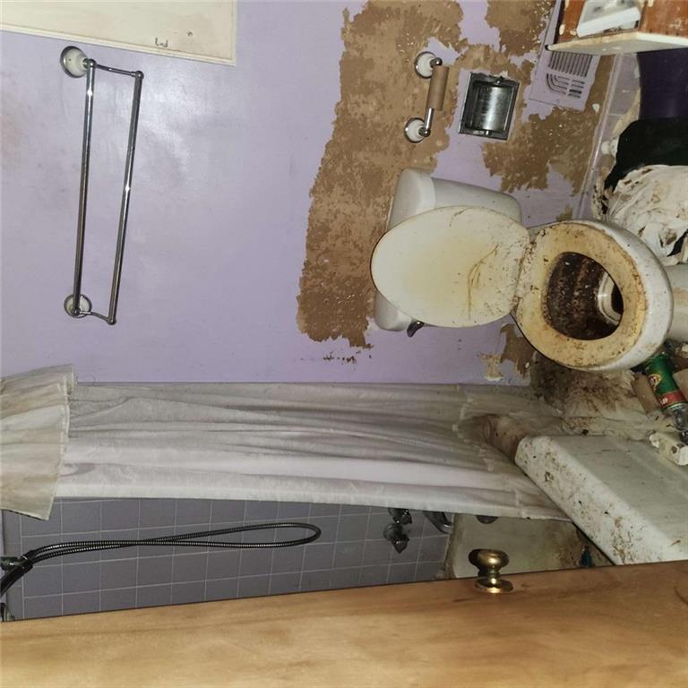 4461 Yates Road College Park, GA 30337 - Photo 5 of 19 a bathroom with a toilet and a sink