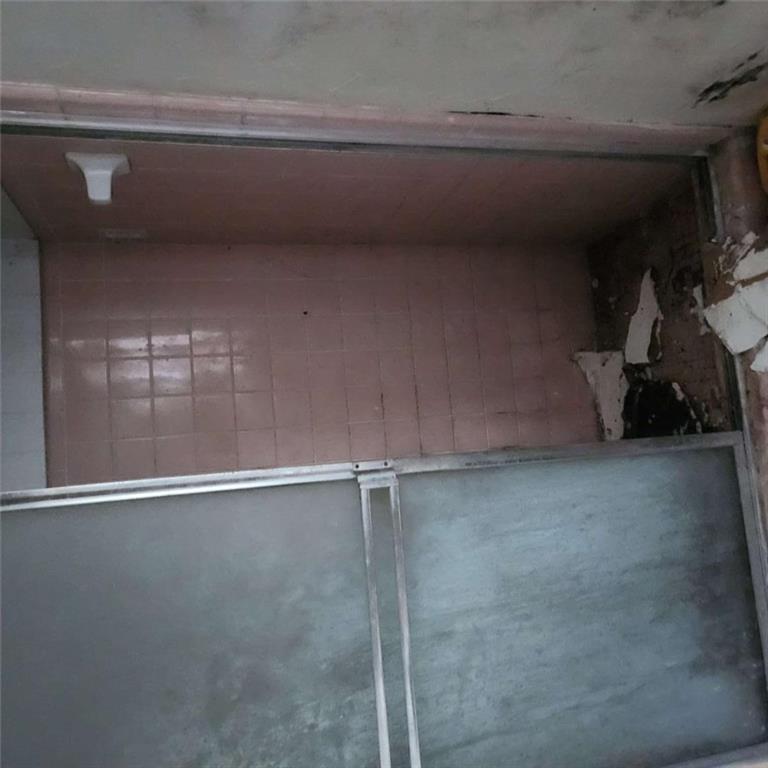 4461 Yates Road College Park, GA 30337 - Photo 7 of 19 a bathroom with a window