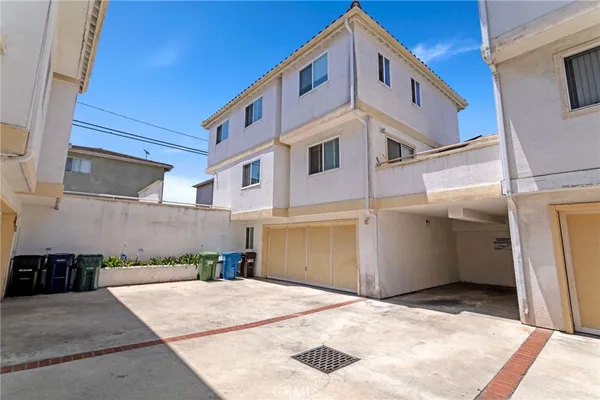 a view of a building with a garage