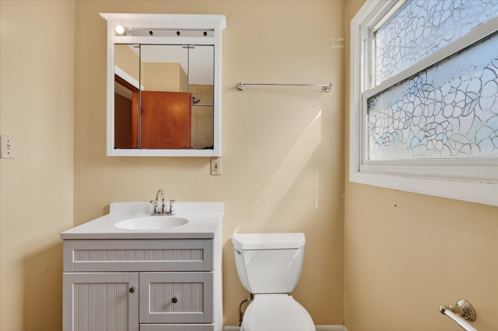 14911 Page Avenue Harvey, IL 60426 - Photo 17 of 35 a bathroom with a toilet sink and mirror