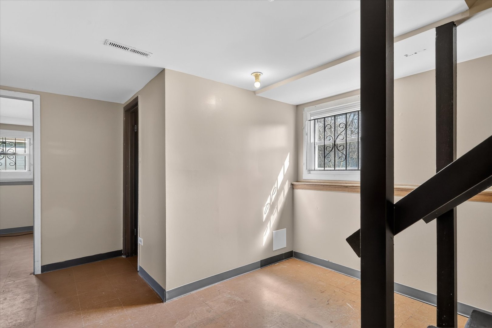 14911 Page Avenue Harvey, IL 60426 - Photo 26 of 35 a view of an entryway with wooden floor and windows