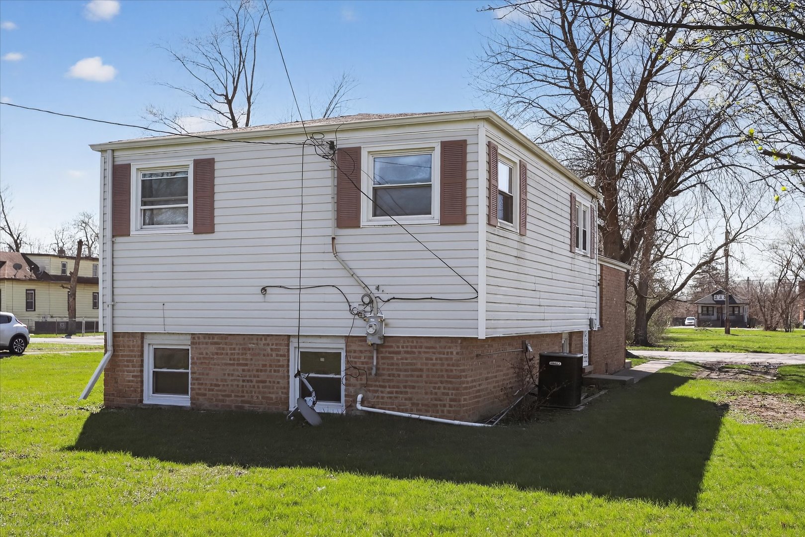 14911 Page Avenue Harvey, IL 60426 - Photo 35 of 35 a view of a house with a yard