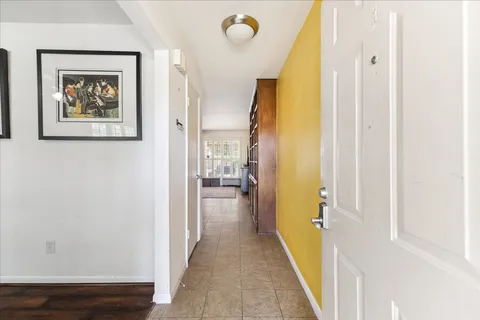a view of a hallway with painted walls