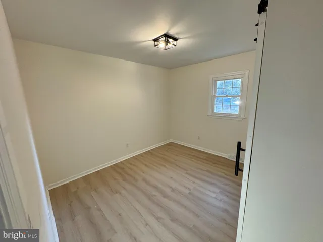 an empty room with a workbench