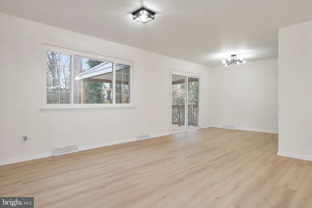 a kitchen with a sink stove and microwave