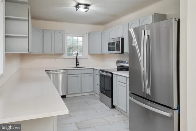 a view of a balcony with wooden floor