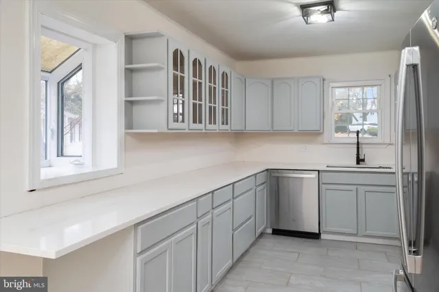 a view of balcony with wooden floor and fence
